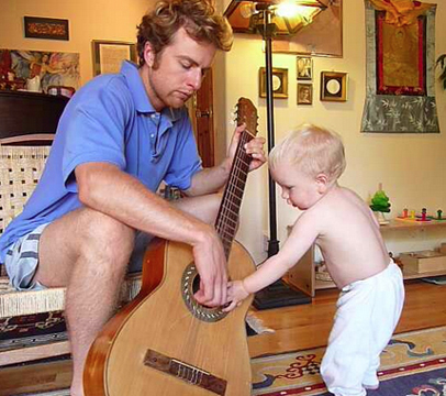 touching the guitar gently